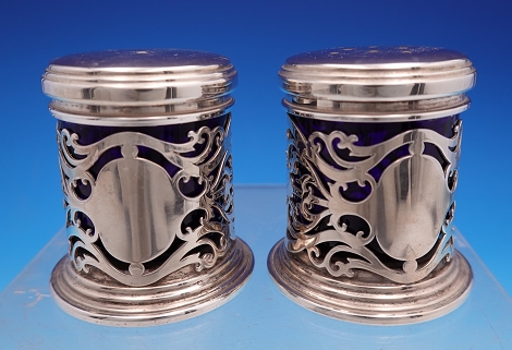 Salt and Pepper set with cobalt glass lining weight with liner made by Broadway and Co. 7.4 oz 2 1/8